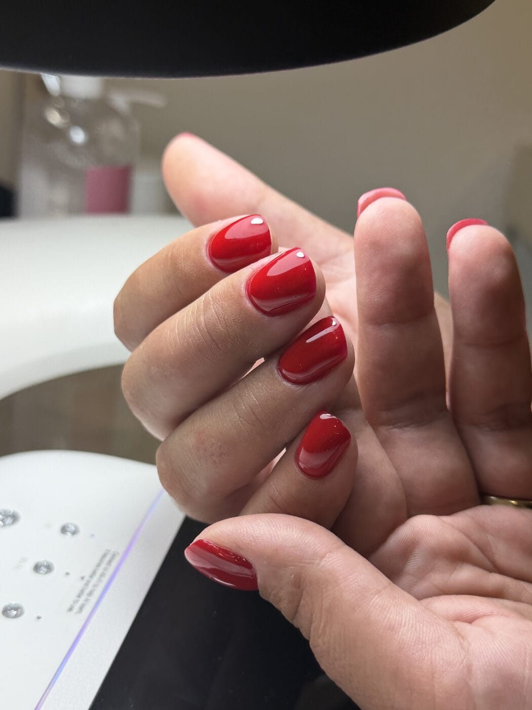 Short red gel manicure at the Bond Street Nail Atelier